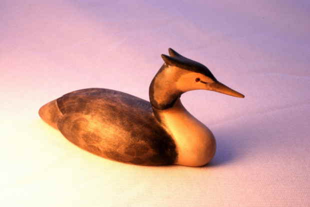 Grebe bird carving